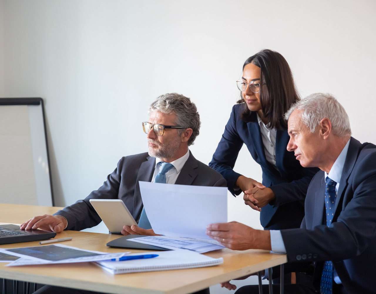 https://reliablelawyers.ca/wp-content/uploads/2022/07/concentrated-partners-using-laptop-working-with-documents-confident-serious-businesspeople-office-suits-discussing-company-project-together-management-business-partnership-concept-1-1280x1000.jpg