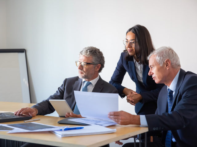 https://reliablelawyers.ca/wp-content/uploads/2022/07/concentrated-partners-using-laptop-working-with-documents-confident-serious-businesspeople-office-suits-discussing-company-project-together-management-business-partnership-concept-1-640x480.jpg